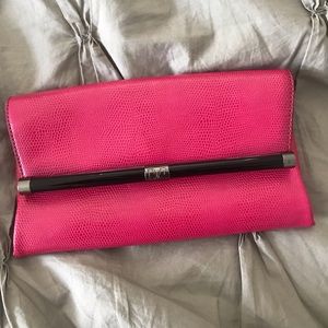 DVF hot pink clutch.